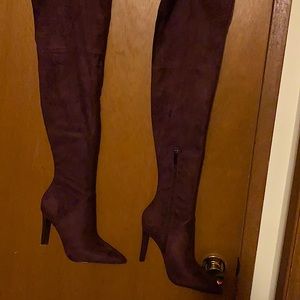Sexy girl wearing thigh high heeled boots!